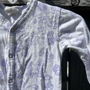 Kate Quinn Floral Button-Up Baby Onesie